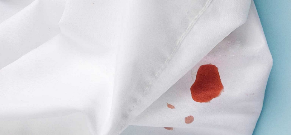 پاک کردن لکه خون با جوش شیرین از روی لباس | خشکشویی آنلاین اکتیو کلینرز